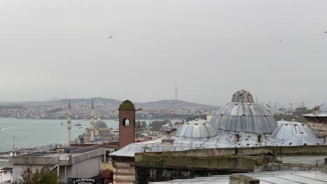 panorama of istanbul, view on bosphorus gulf from suleymaniye mosque in cloudy foggy autumn weather