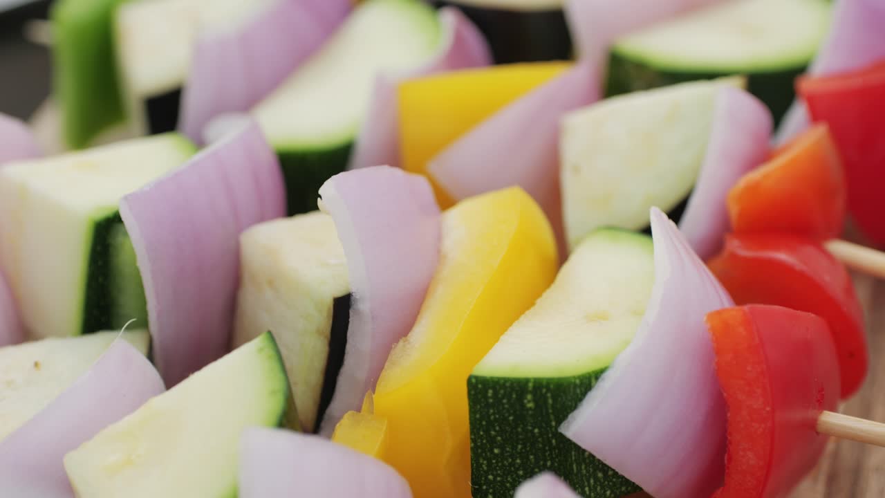Vegan vegetarian bbq barbuque, grill Many various of green vegetables on plate close-up. Fresh artichoke, green pepper, zucchini, avocado. Cafe and restaurant food.