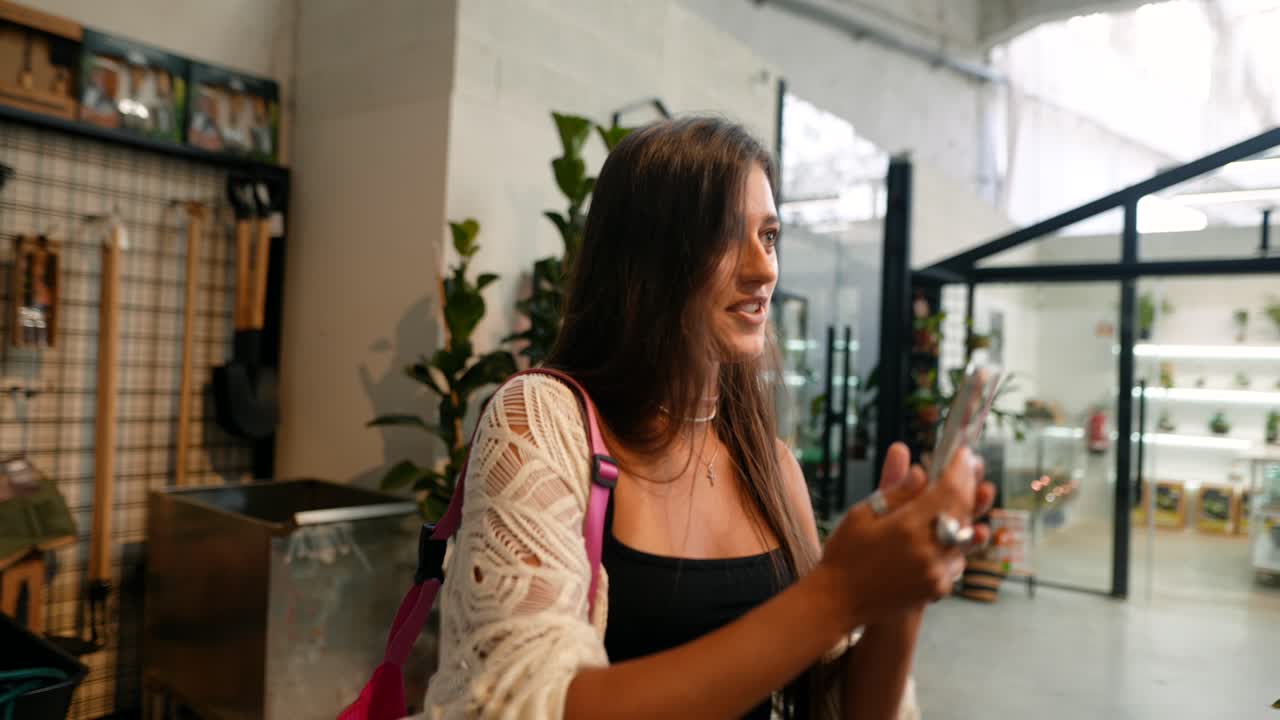 Woman shopping in a plant store