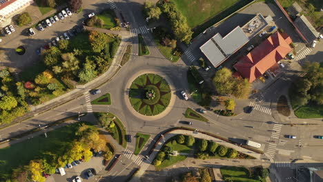 Flying-over-city-area-roundabout-in-autumn