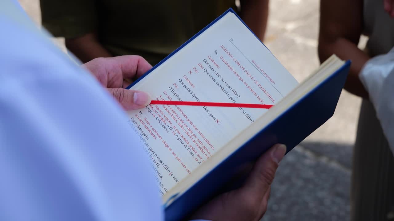 Catholic Priest Reading Bible – Religious Ceremony and Devotion