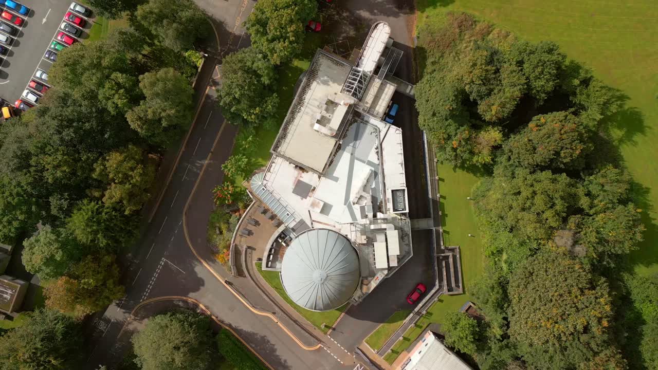 Descending overhead 4K 60FPS aerial of Armagh Planetarium and the surrounding area in Northern Ireland in the UK. Produced with Rec709 color