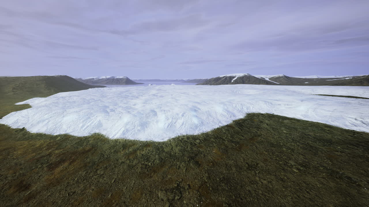 Expansive view of a glacier melting in a remote natural landscape