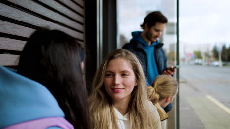 young people at bus stop