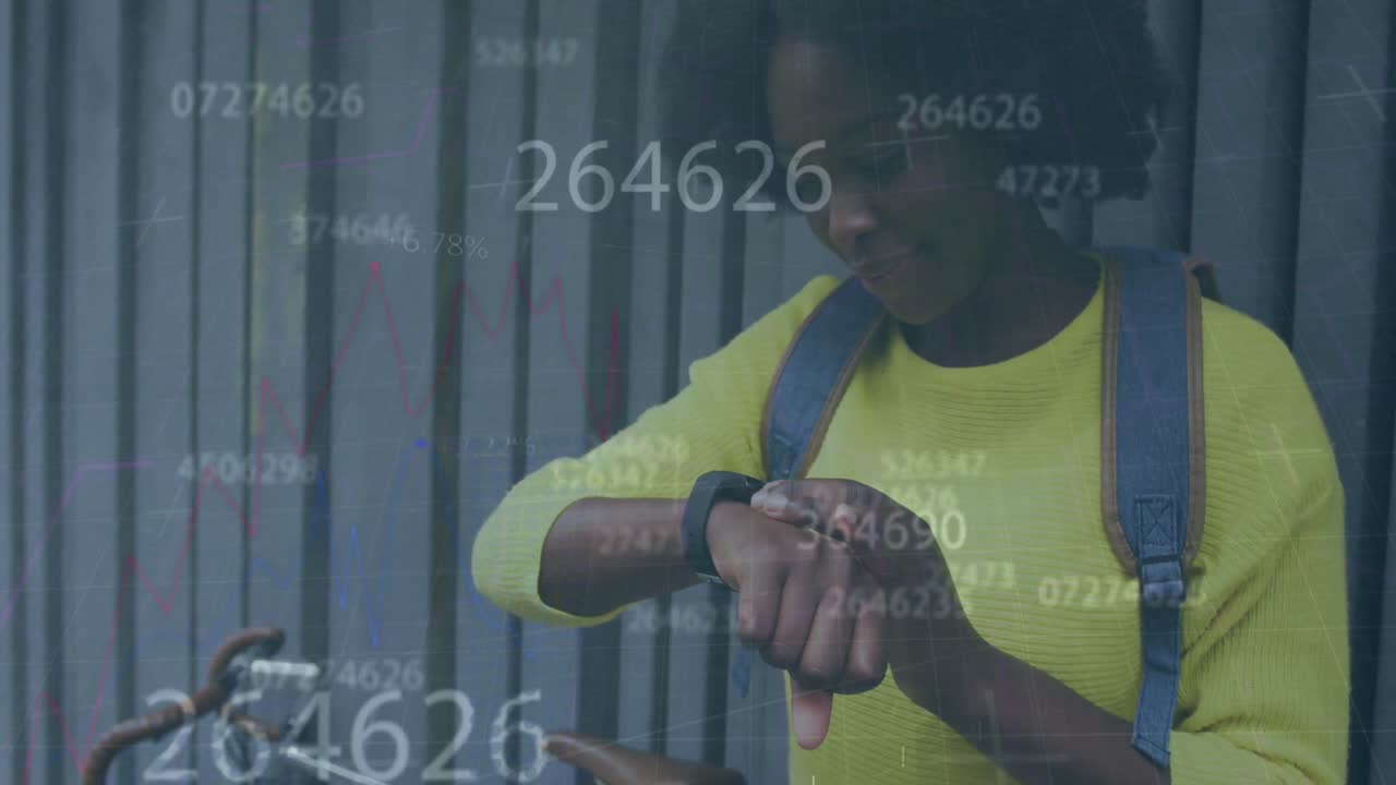 Multiple changing numbers floating over african american woman using smartwatch on the street