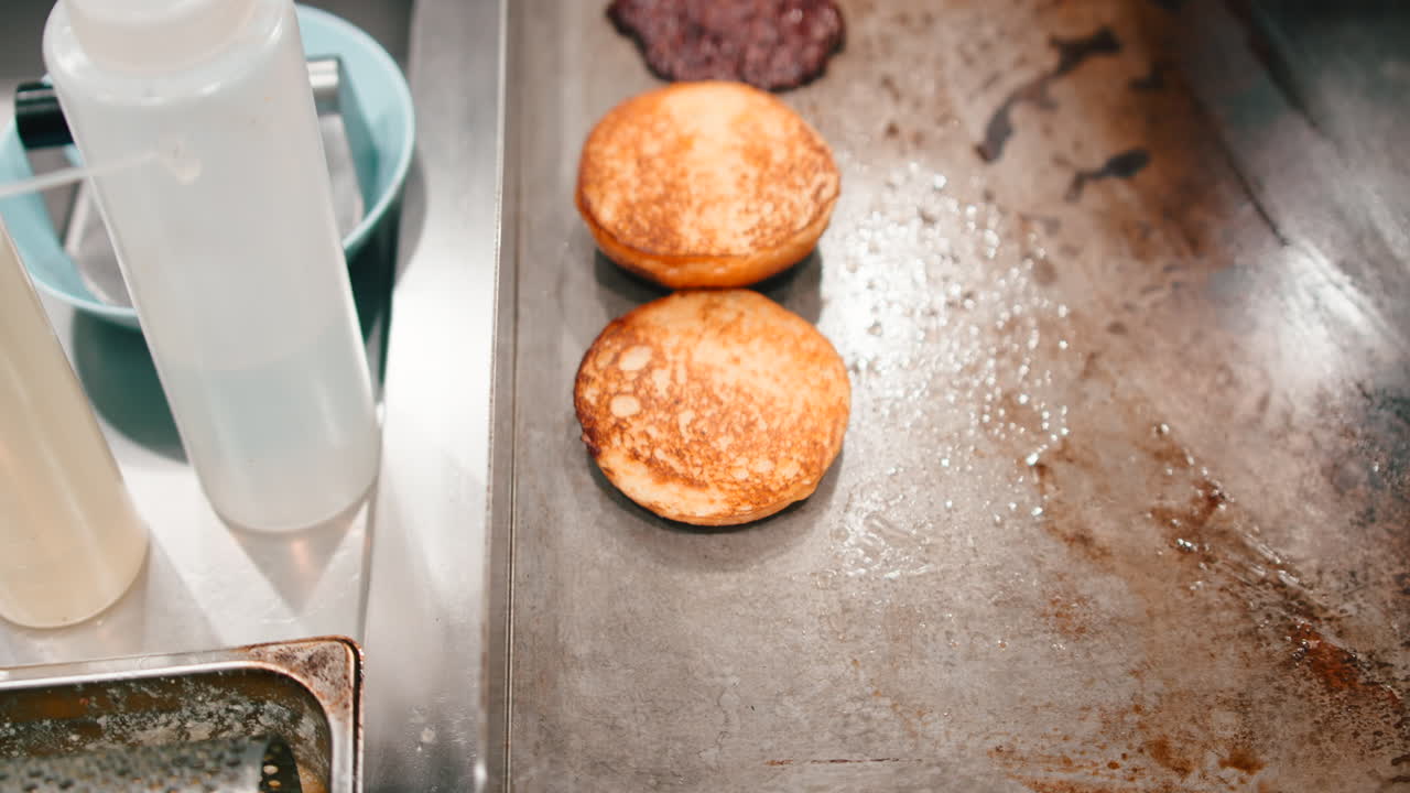 Burger preparation on a griddle