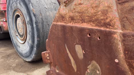 the huge tyres and bucket of an underground mining loader