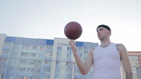 man juggling a basketball