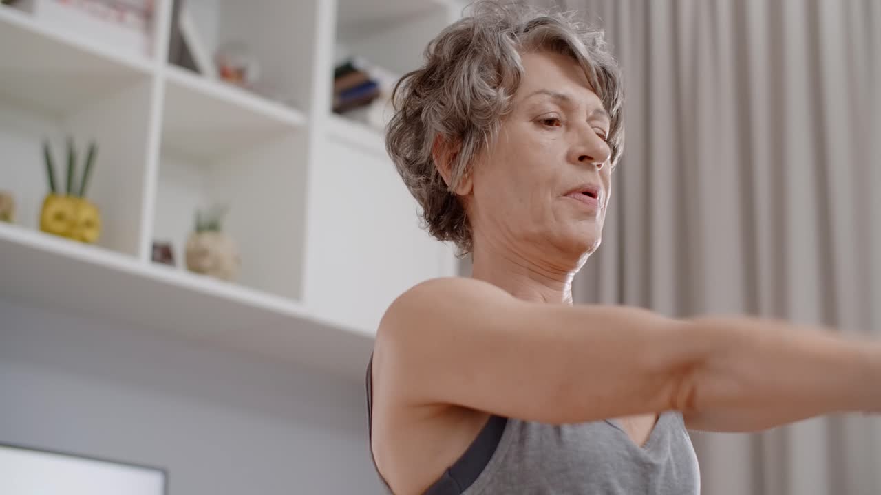 Senior Woman Exercising at Home