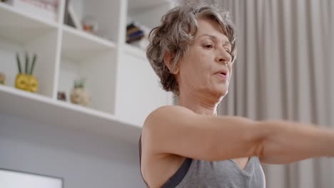 senior woman exercising at home