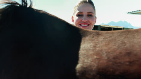 mother and daughter touching the horse 4k