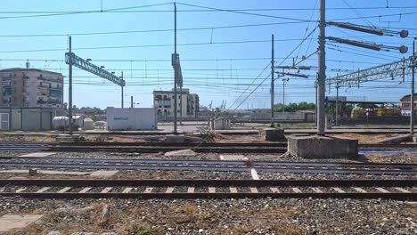 a train moves through a railway station in turin