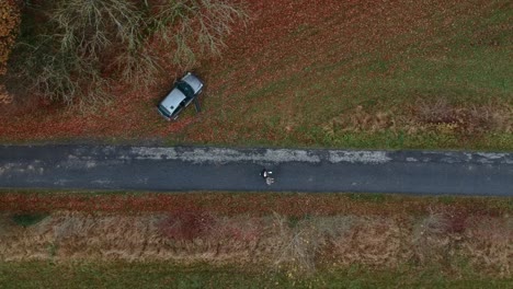 2 people walking on a trial