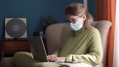 young female working from home during quarantine