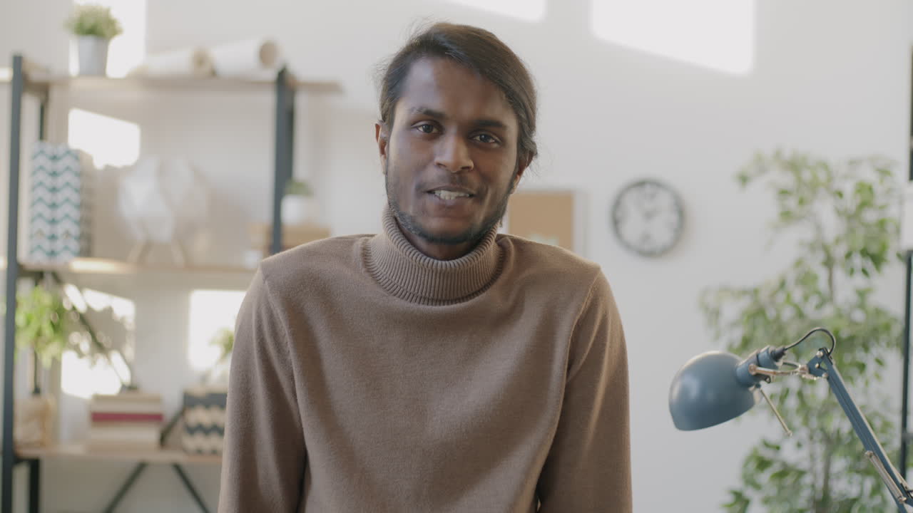 Smiling Man in an Office Setting