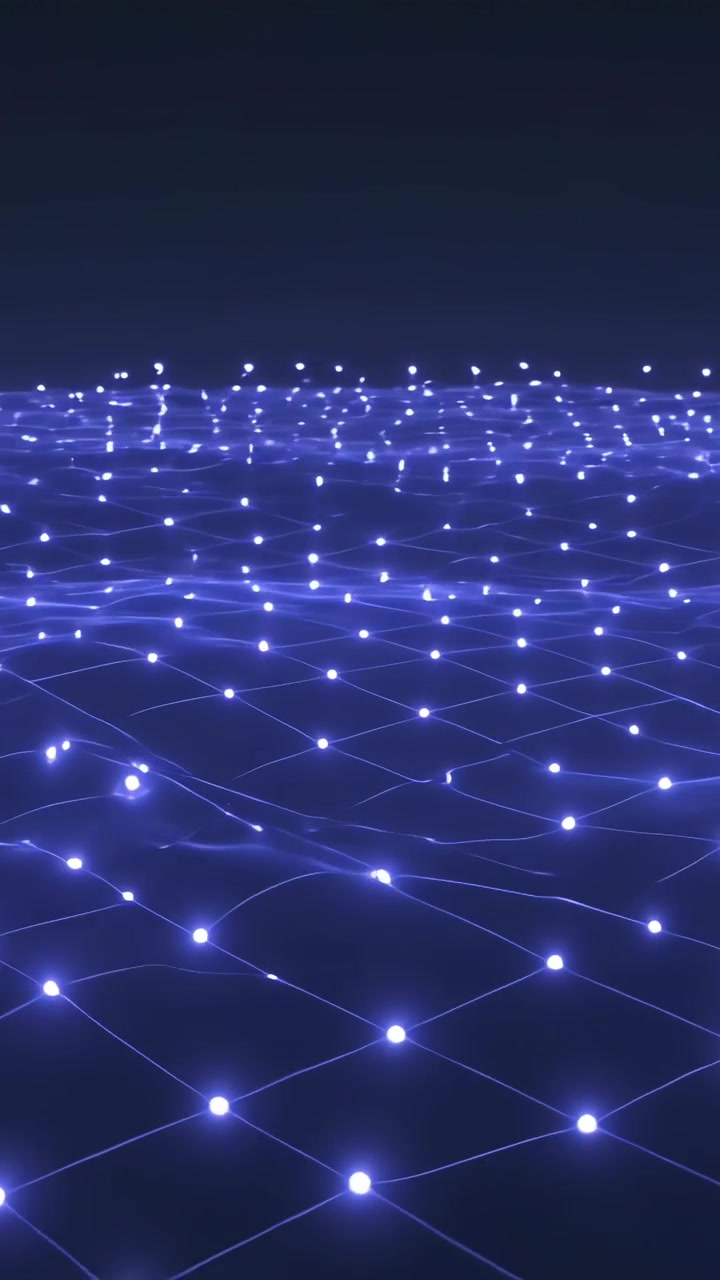 Vertical video: Advancing frames showing blue nodes pulsing over digital void mesh, forming wave