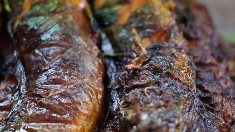 detailed view of fish grilling on a leaf