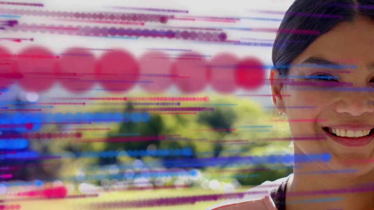 Woman smiling in park while animation starting frame3, colored lines sweeping over face for design