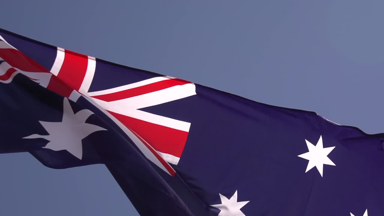 Slow-motion of Australian flag waving in the wind