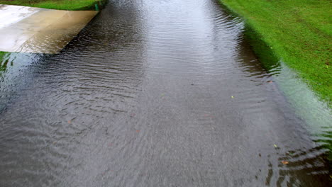 downward angle drone shot of a flooded street