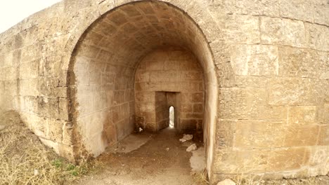 loophole window of urfa castle inside view snow and rain