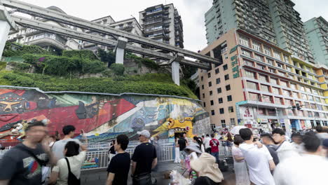 CHONGQING, CHINA - 28 MAY 2025 : train enters liziba station inside a building on bridge in Chongqing china