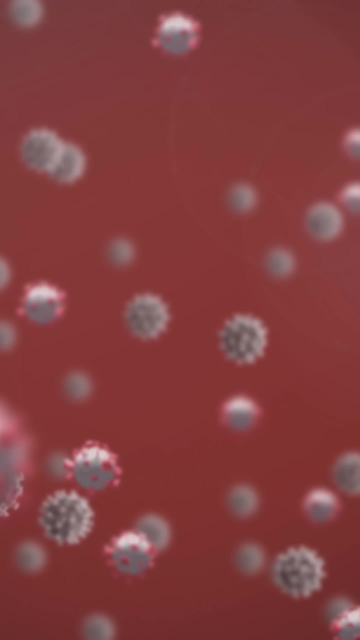 Animazione di cellule virali su sfondo rosso