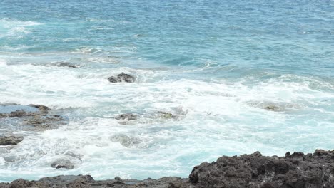 Ocean-water-rinsing-on-the-rocks-on-the-shore