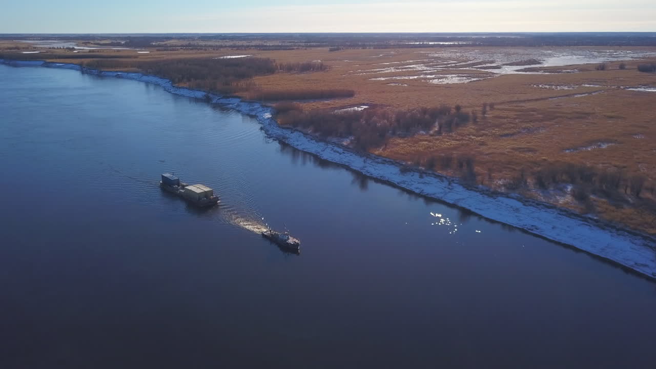 Winter River Scene with Barge and Tugboat