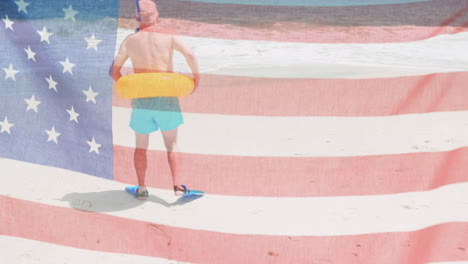 animation of flag of usa over caucasian senior man on beach in summer