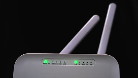 white colour wifi router power testing in closeup led blink network power on off