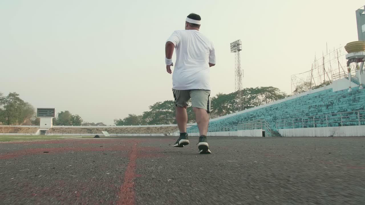 Fat Man Running For Exercising