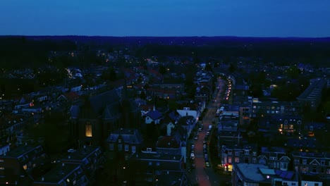 Establishing-of-Dutch-city-Arnhem-by-night-in-dark-twilight-light-drone-top-view