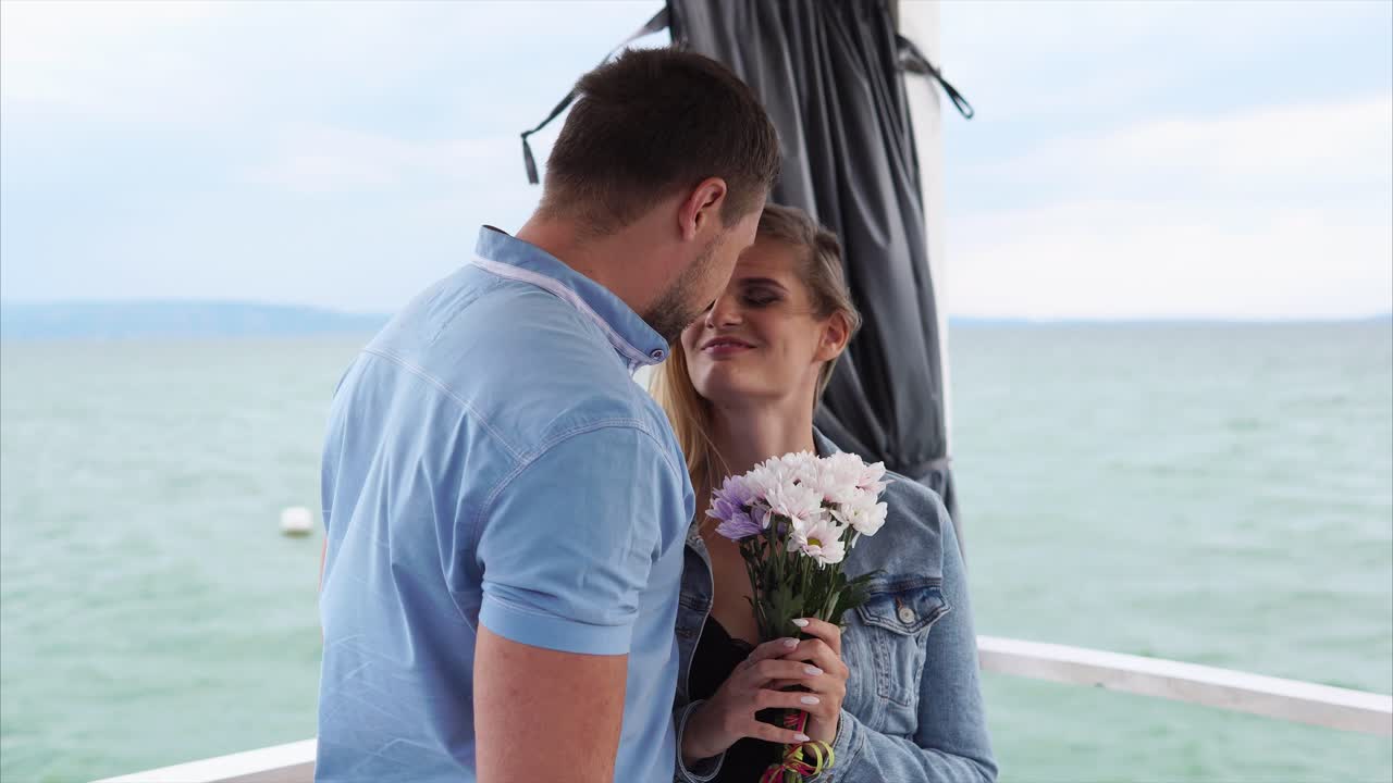 Couple enjoying a romantic moment on a boat