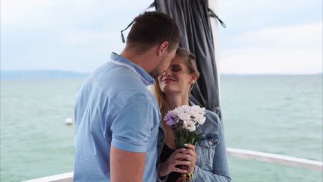 couple enjoying a romantic moment on a boat