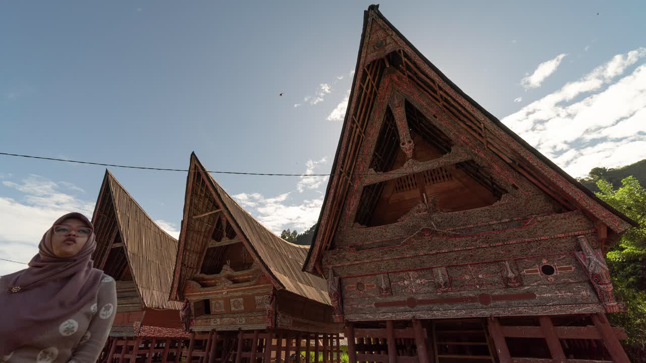 Traditional Batak Houses with Ornate Carvings