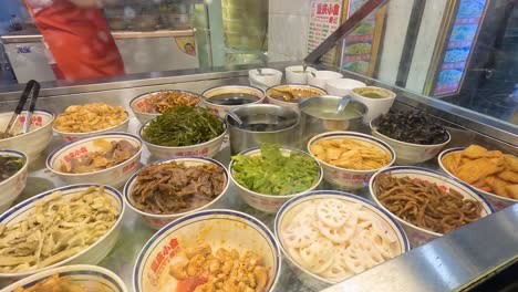 variety of dishes at a food stall