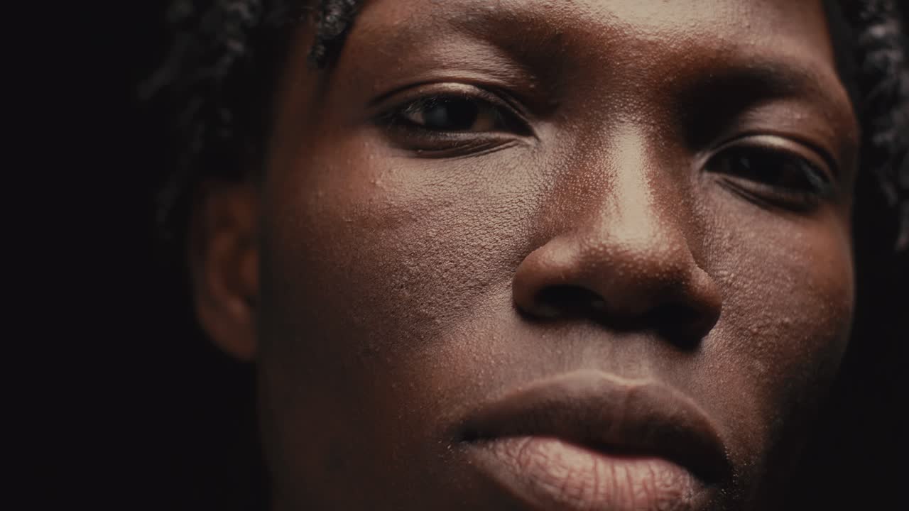 Close-Up Portrait of Young African American Man with Braids