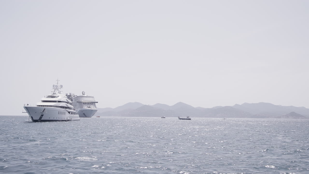Luxury Yacht and Cruise Ship at Sea