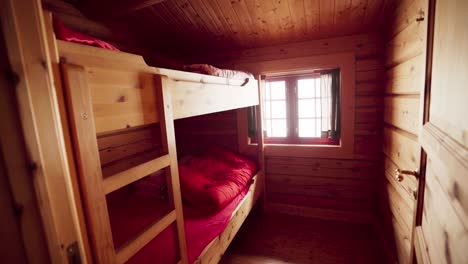 chalet interior with bunk bedroom. handheld shot