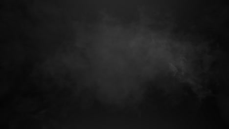 Animation-of-cloud-of-orange-and-grey-smoke-appearing-and-disappearing-on-black-background