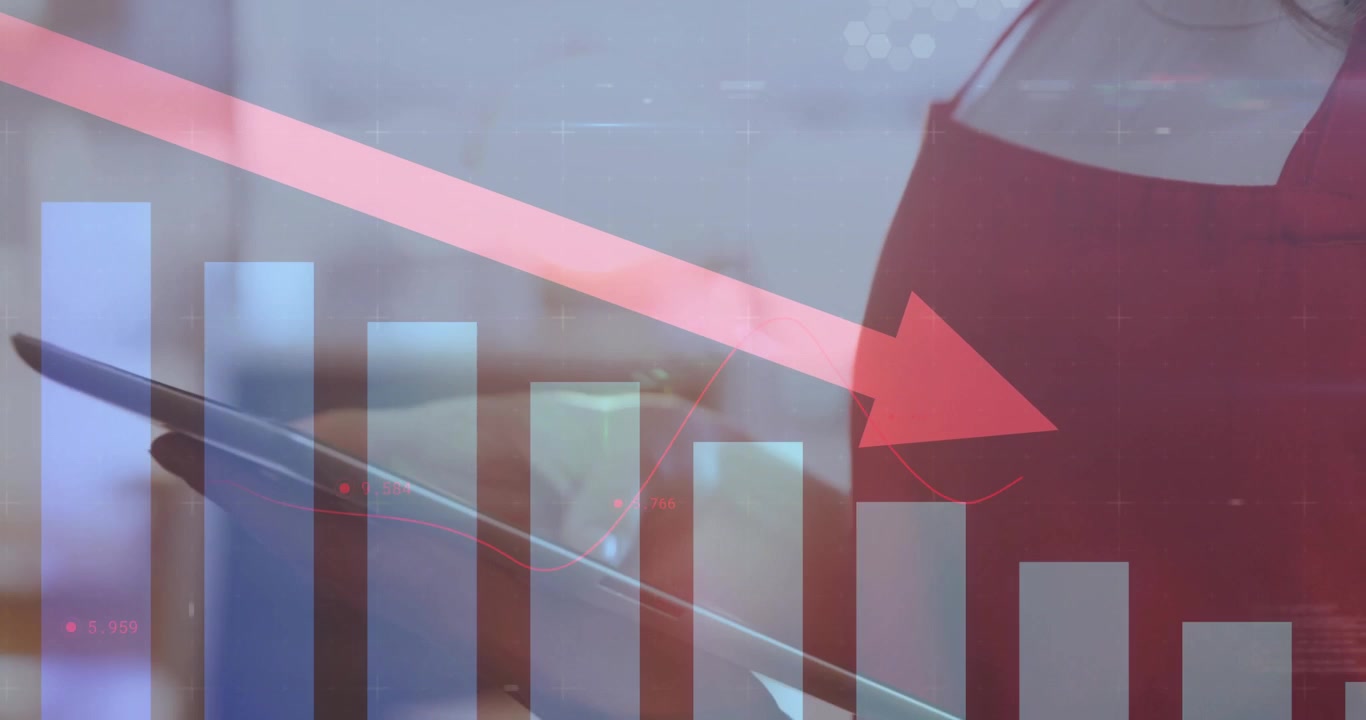 Upon tapping tablet screen, business analyst viewing bar chart with red arrow tracking data decline