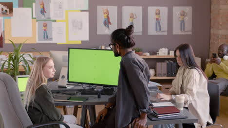 multiethnic team of graphic designers working together in an animation studio 8