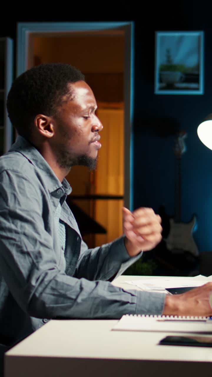 Man working at desk in home office