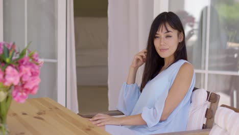 Man-giving-flattered-woman-a-ring-at-table