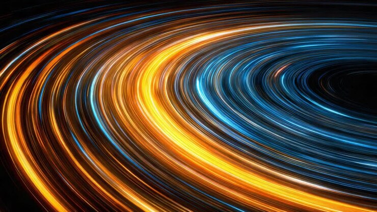 Un viaggio affascinante nello spazio: vortici dinamici di energia e luce catturati in un movimento ipnotico che mette in mostra blu vibranti e arancioni infuocati