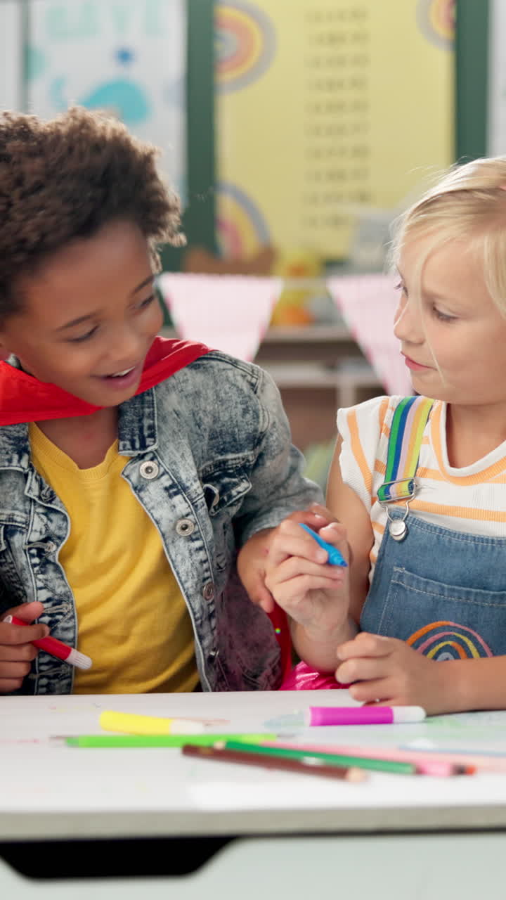Two Children Drawing Together in Classroom