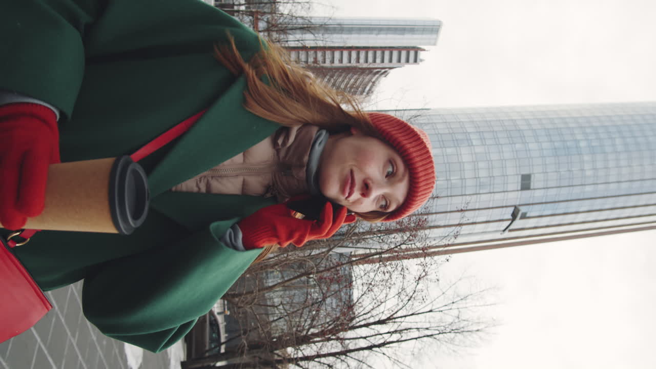 Woman walking in city during winter