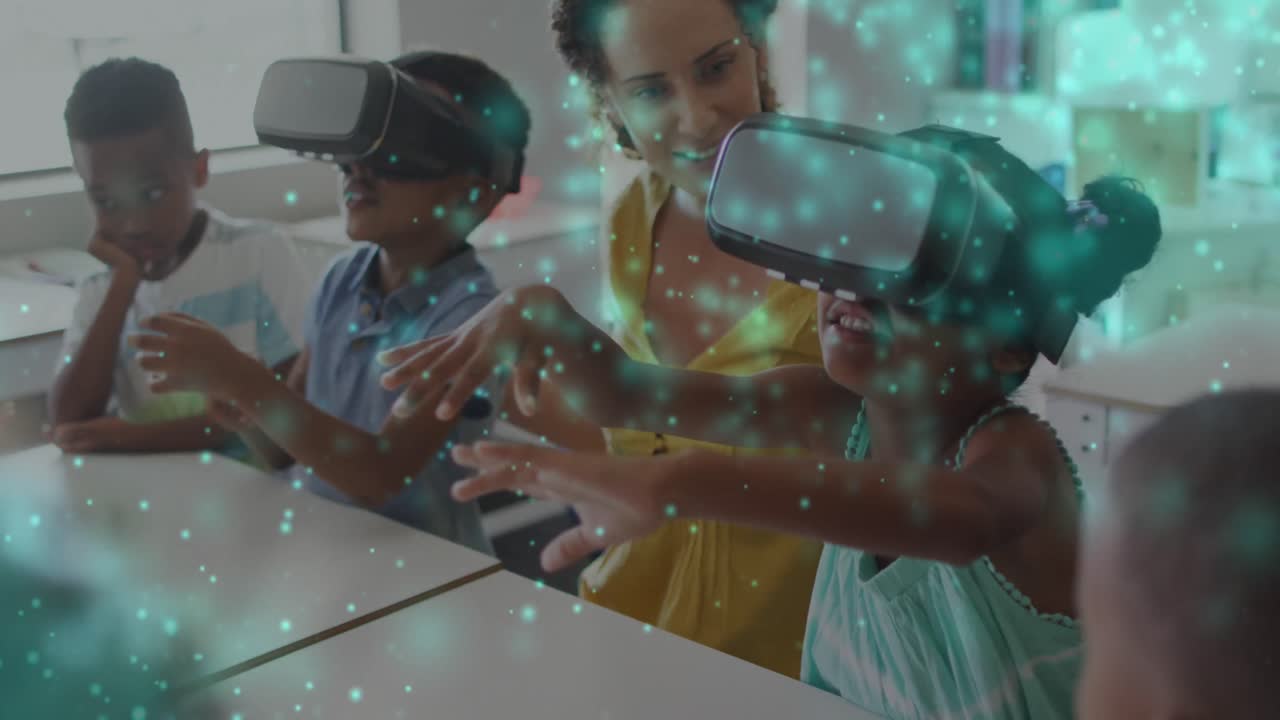 Animation of particles of light over diverse female teacher and pupils in vr headsets in classroom