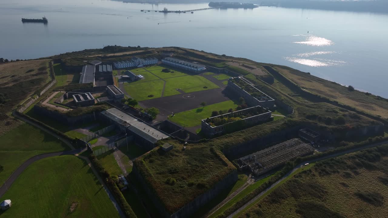 Spike Island, County Cork, Ireland, September 2024. Drone angled overview with museum front as pointed walls and lawns showcased from aerial overview on overcast day,